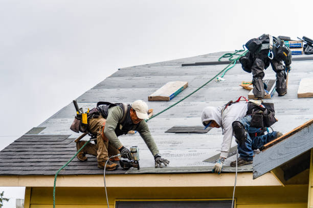 Professional Gutter Installation technician working in Dewey, OK